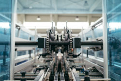 robotic factory line for packaging of bottled pure spring water selective focus short depth of field